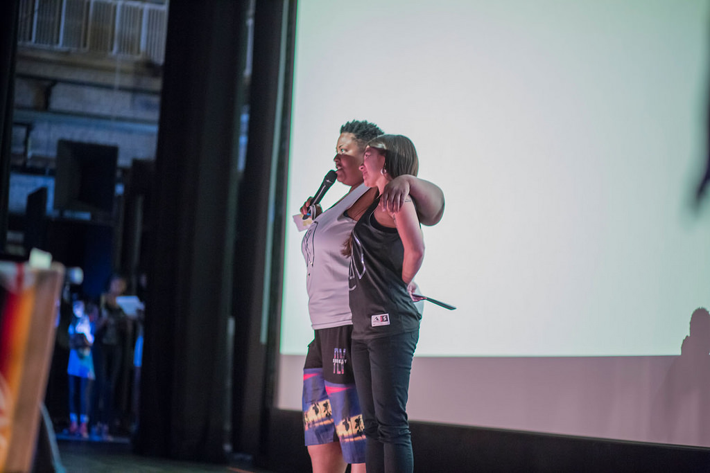 Mo on stage at the AMC with her arm around director Jenny Lee