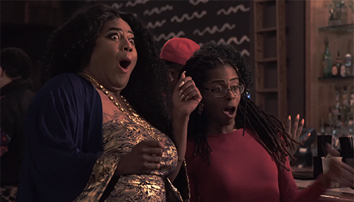 Still from Femme Queen Chronicles with two actors shocked