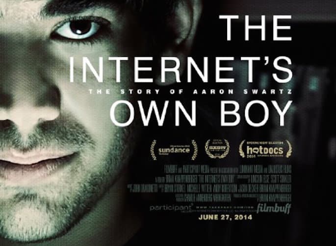 Movie poster for "The Internet's Own Bow" with a brightly lit close up face of Aaron Swartz with a dark background