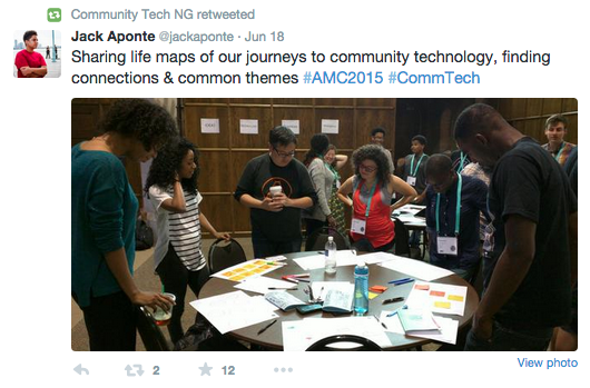 Screenshot of a tweet showing people standing around a round table in a life mapping exercise